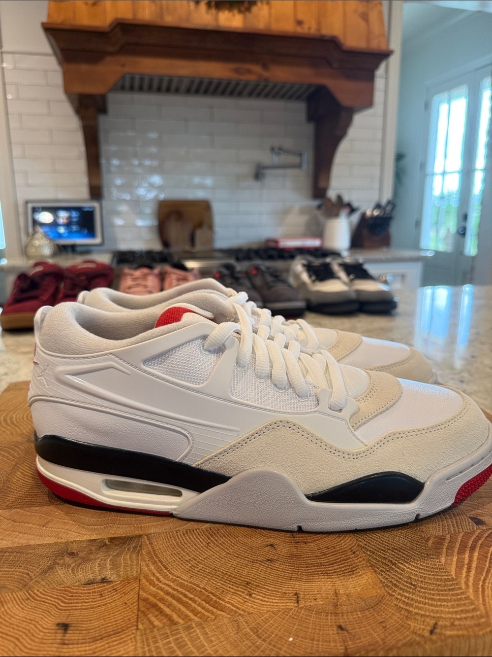 Men's Nike Air Jordan’s White and Black Low-Top Sneakers with Red Accent - Picture 3 of 4
